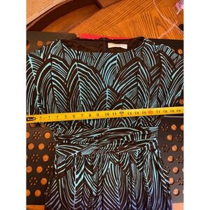 Trina Turk dress size cut out zip up in back purple brown green colors